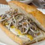 A delicious plate of montadito de gulas con alioli